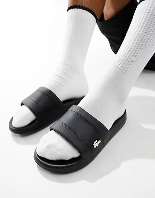 Lacoste Serve Gold Pin Sliders In Black Cover