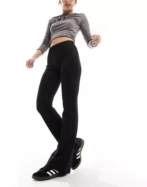 Mango flare leg pants in black Cover