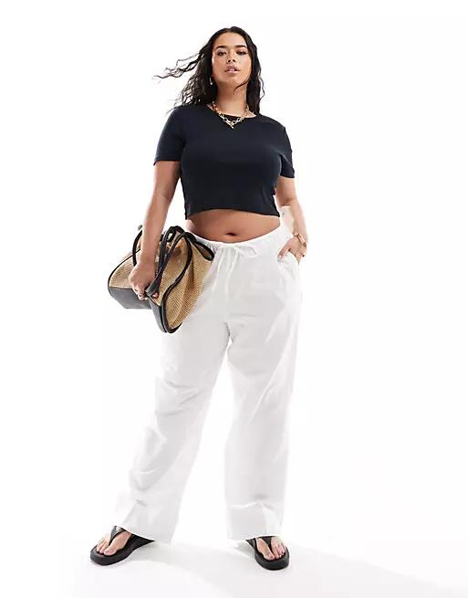 Vero Moda Curve tie waist wide leg pants in white Cover