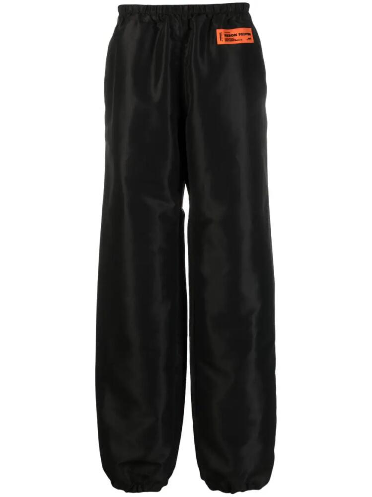 Heron Preston logo-patch wide-leg trousers - Black Cover