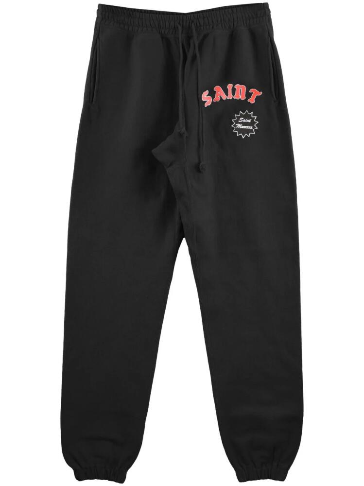 SAINT MXXXXXX logo-print cotton track pants - Black Cover