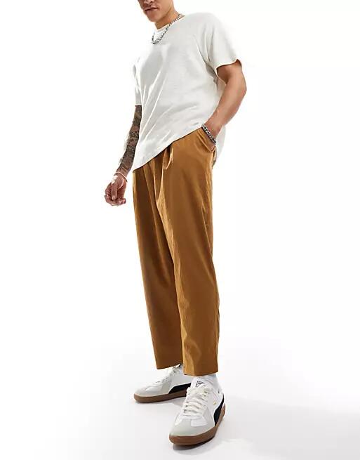 Reclaimed Vintage relaxed wide leg pull on cropped pants in brown Cover