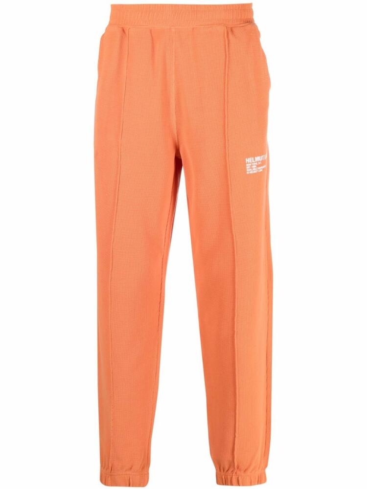 Helmut Lang logo-print tapered joggers - Orange Cover