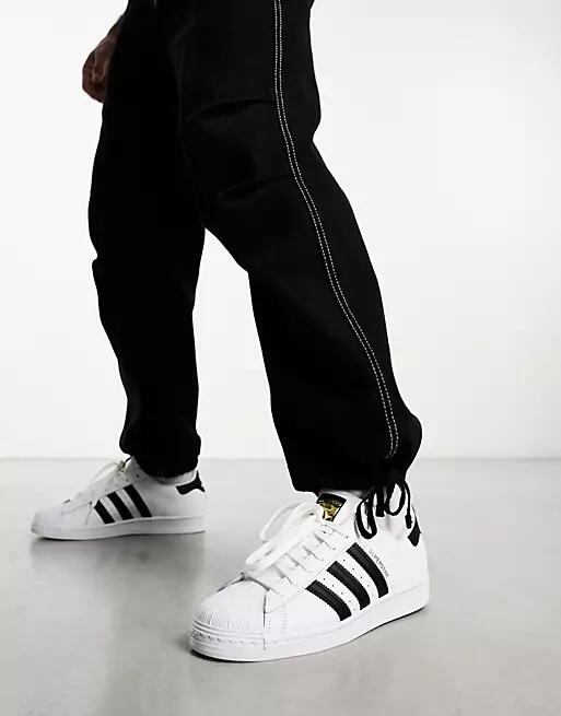 adidas Originals Superstar sneakers in white and black Cover