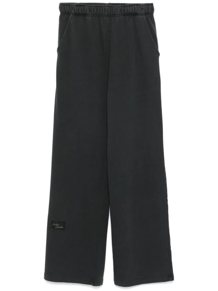 Joshua Sanders flocked-slogan track pants - Black Cover