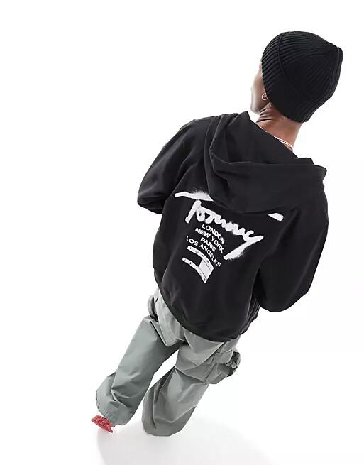 Tommy Jeans regular spray paint logo hoodie in black Cover