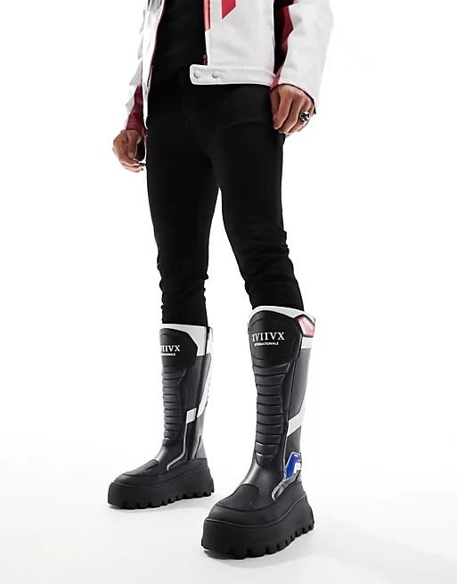 ASOS DESIGN chunky knee high biker boots with motocross details in black Cover