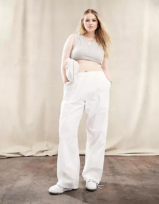 ASOS DESIGN Curve clean pull-on cargo pants in white Cover