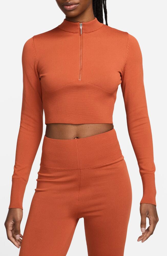 Nike Open Back Crop Sweater in Burnt Sunrise/Black Cover