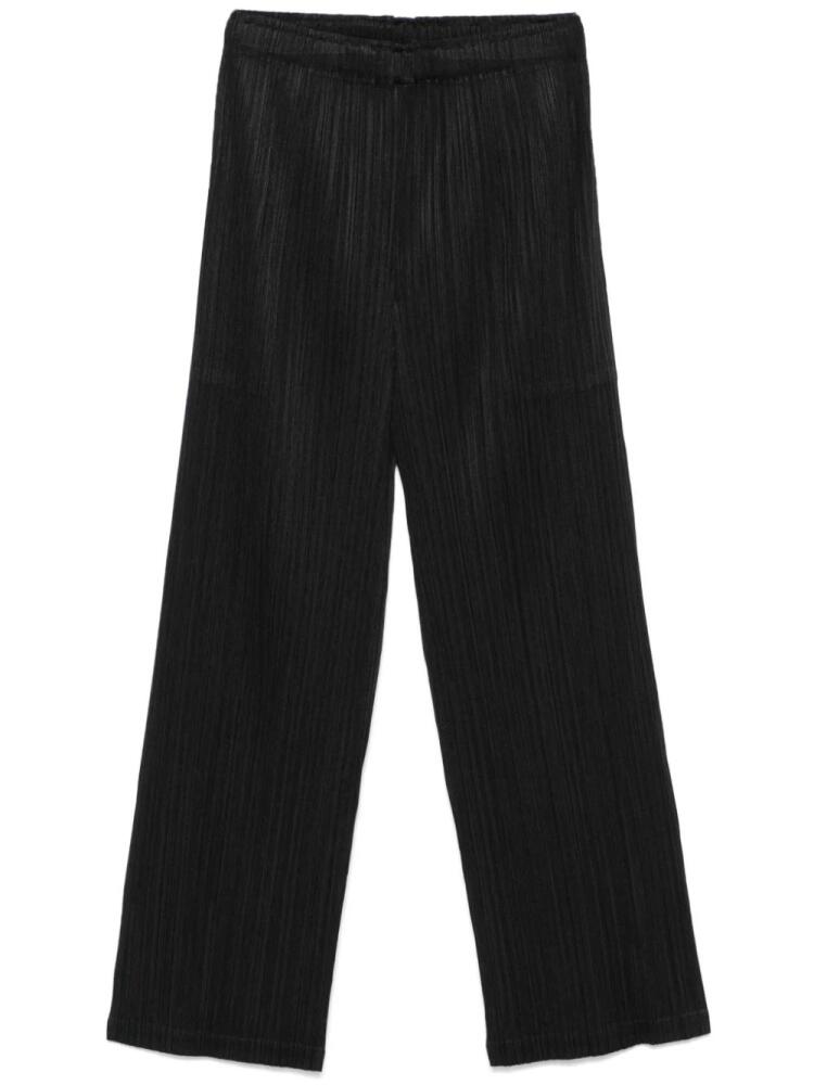 Pleats Please Issey Miyake plissé trousers - Black Cover