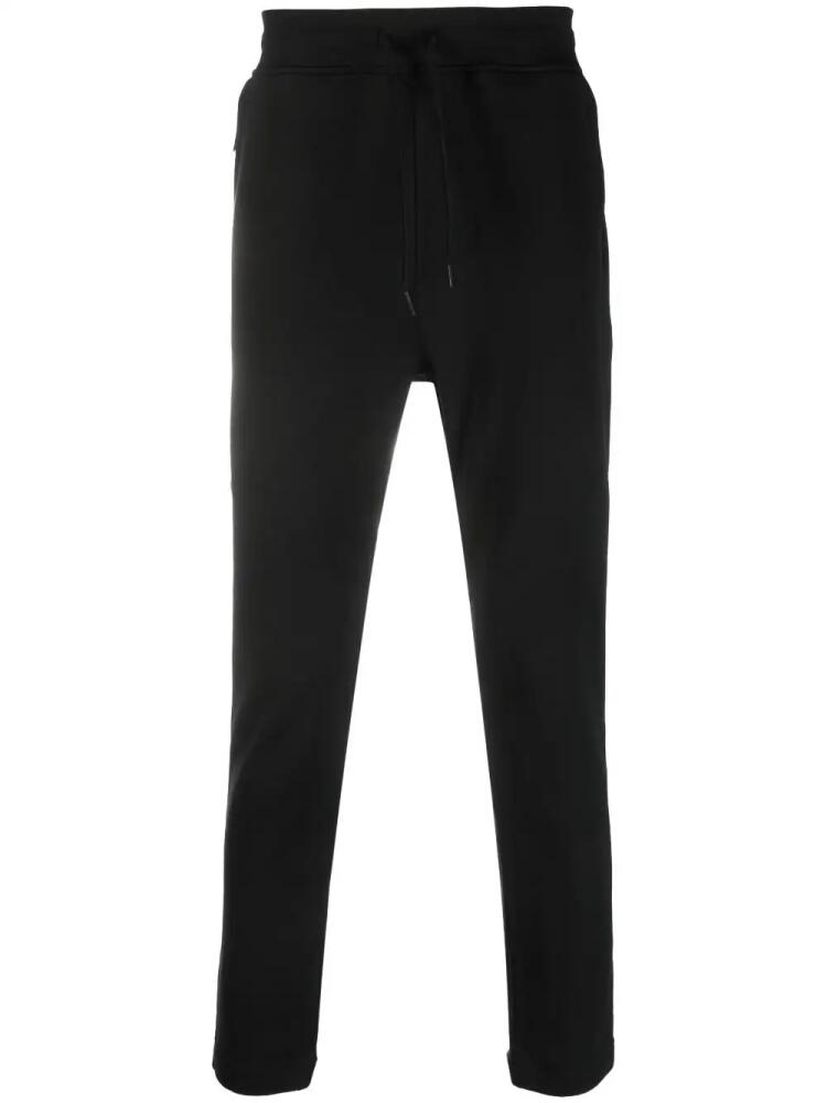 C.P. Company logo-patch stretch-cotton track pants - Black Cover