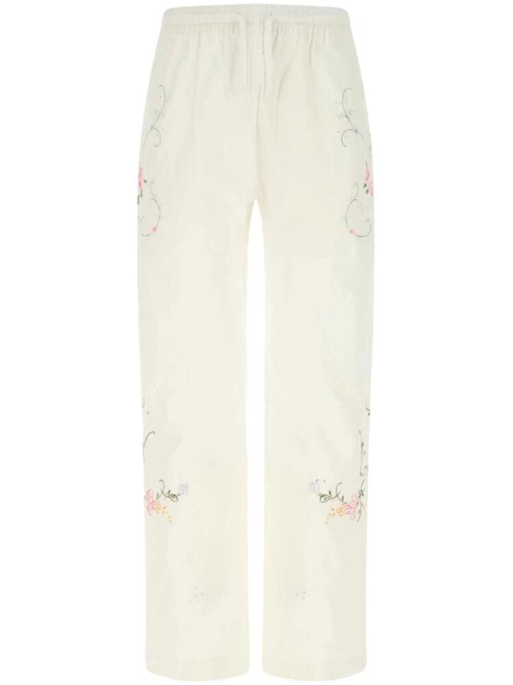 Marine Serre floral-print cotton trousers - White Cover