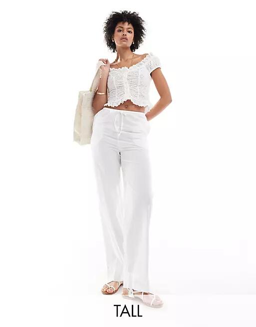 Vero Moda Tall tie waist wide leg pants in white Cover