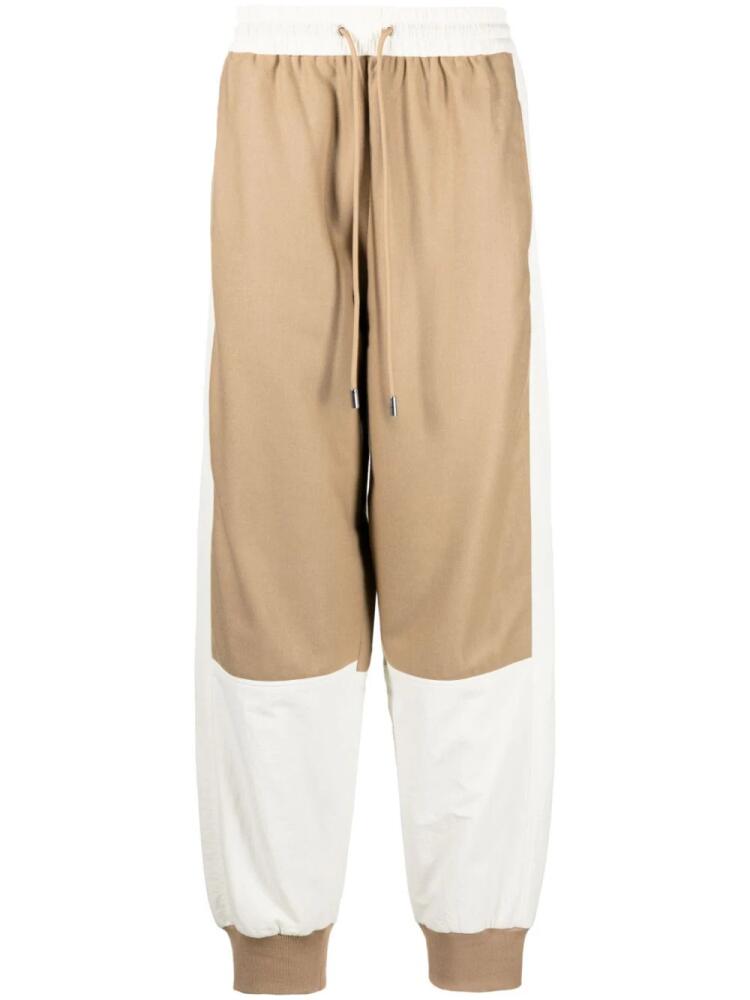 JW Anderson colour-block tapered track pants - Brown Cover