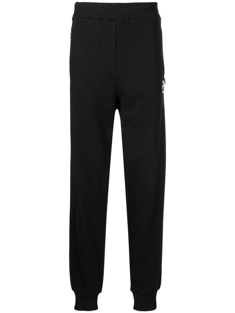 Roberto Cavalli logo-plaque tapered track pants - Black Cover