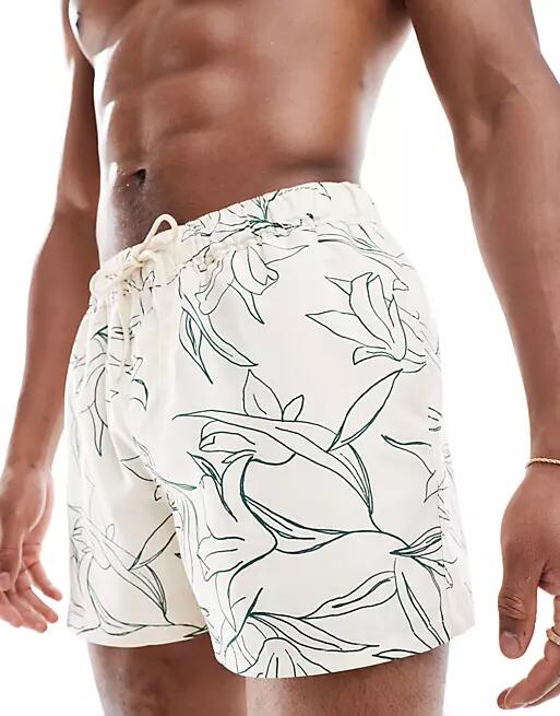 ASOS DESIGN swim shorts in short length with floral print in beige-Neutral Cover