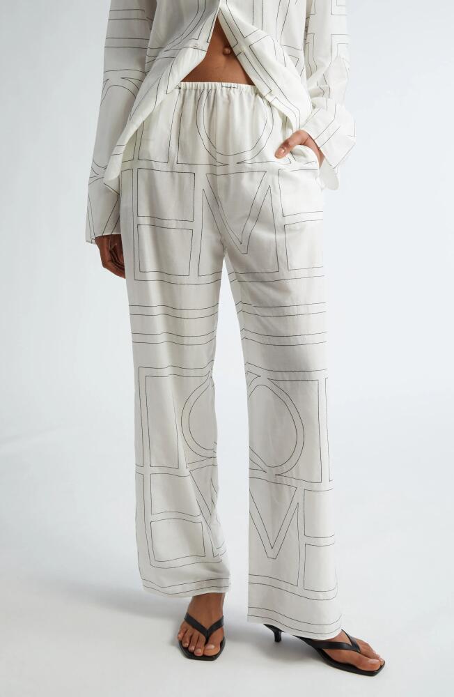 TOTEME Monogram Embroidered Pull-On Pants in White/Black Cover