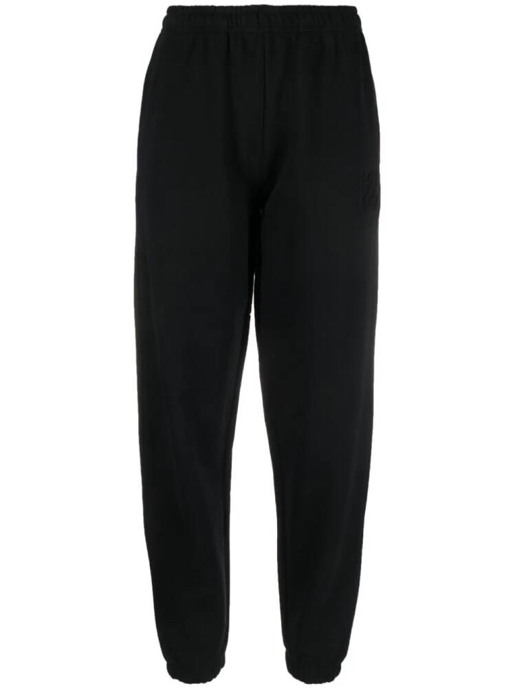 HUGO appliqué-logo tapered track pants - Black Cover