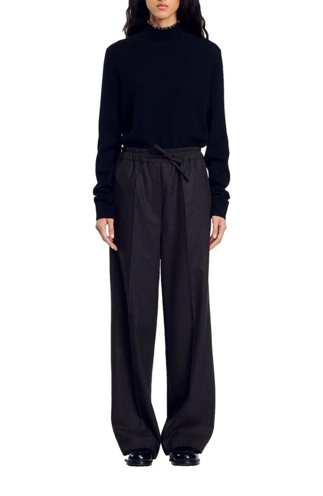 SANDRO Striped trousers in Black Brown Cover