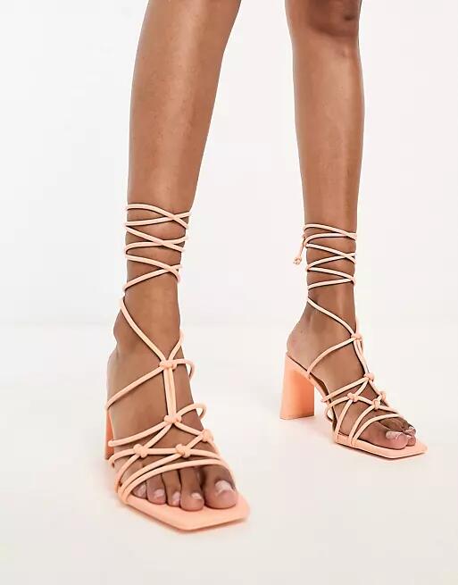 Stradivarius knot front strappy heeled sandal in orange Cover