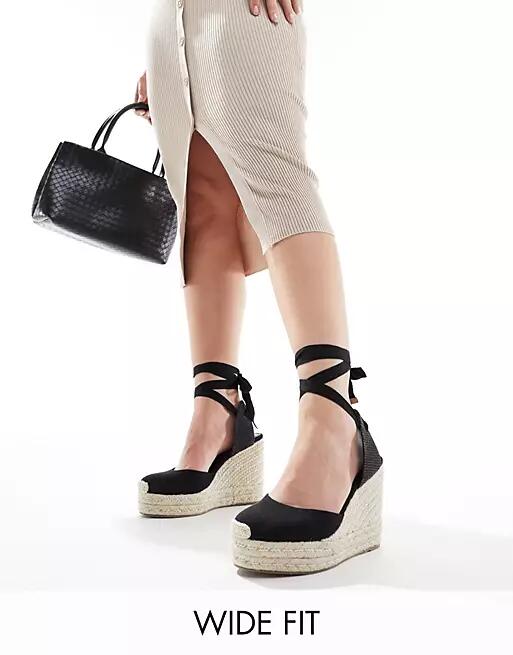 ASOS DESIGN Wide Fit Tyra closed toe wedges in black linen Cover