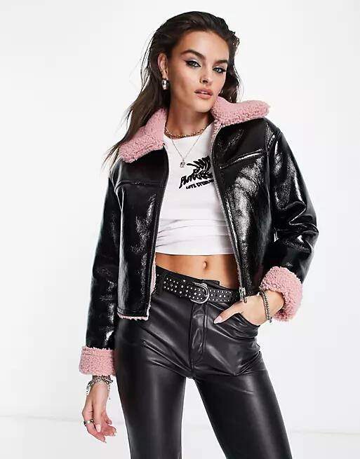 Bershka faux shearling detail cropped jacket in black vinyl with pink trim Cover