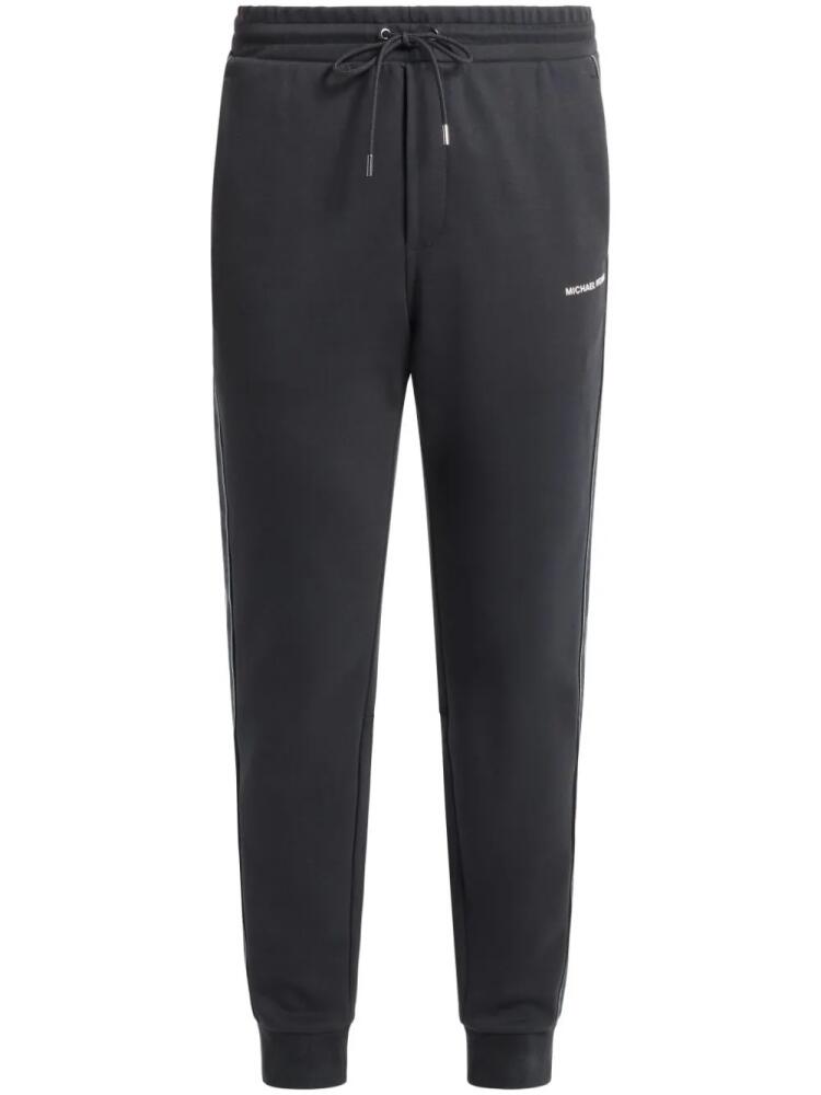 Michael Kors printed tapered track pants - Black Cover