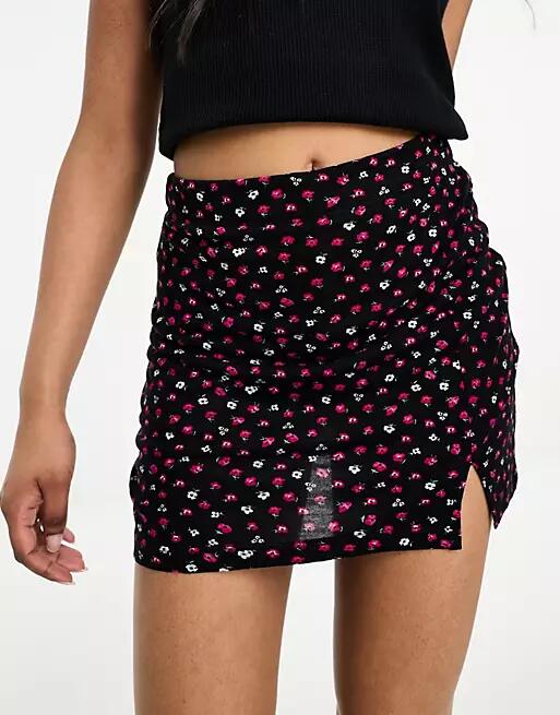 Only notch front mini skirt in black and red ditsy floral Cover