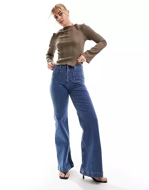 & Other Stories high waist flared jeans in deep blue Cover