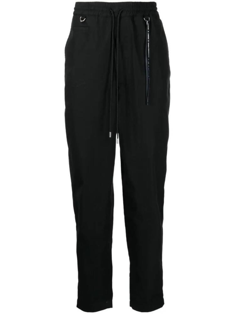 Mastermind World logo-print tapered-leg trousers - Black Cover