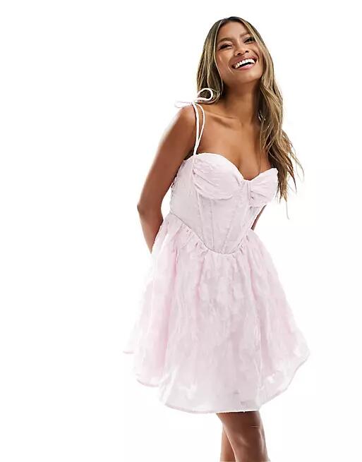 Love Triangle corset mini dress with tie shoulders in pink lace Cover