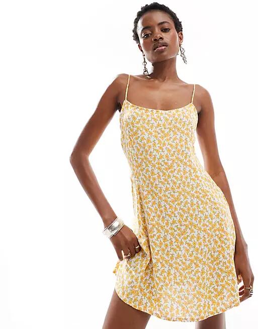 Motel alvary cosmos floral print mini swing dress in yellow Cover