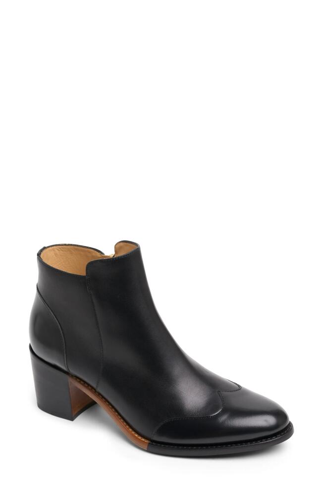 The Office of Angela Scott Miss Rosario Wingtip Bootie in Black On Black Cover