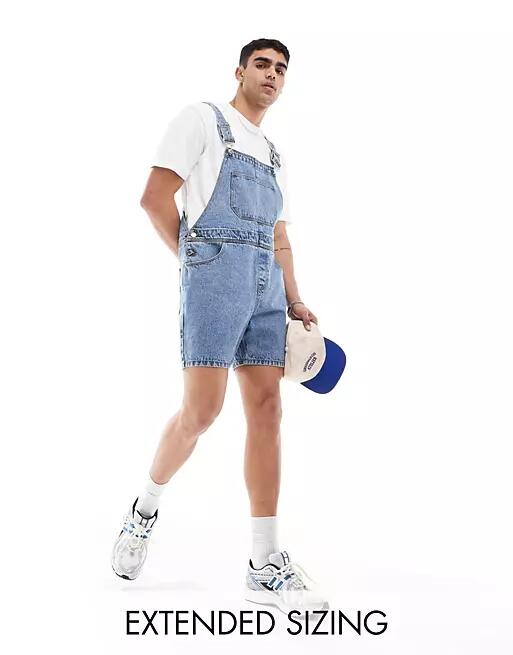 ASOS DESIGN short length denim overalls in mid wash blue Cover