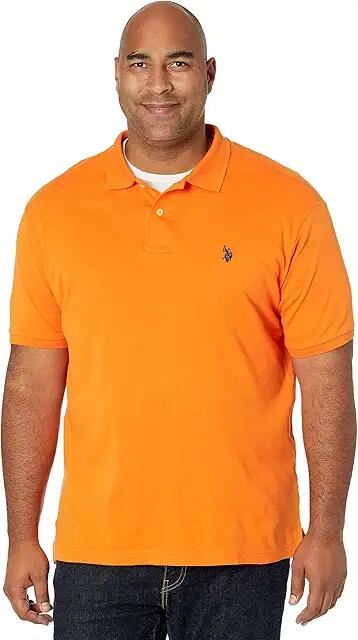 U.S. POLO ASSN. Solid Interlock Polo (Pumpkin Pie) Men's Short Sleeve Knit Cover