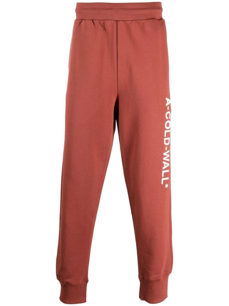 A-COLD-WALL* Essential logo-print track pants - Red Cover