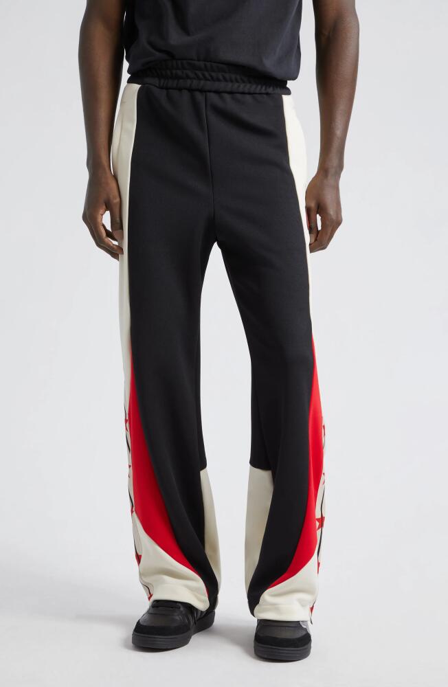 Palm Angels Star Colorblock Track Pants in Black White Cover