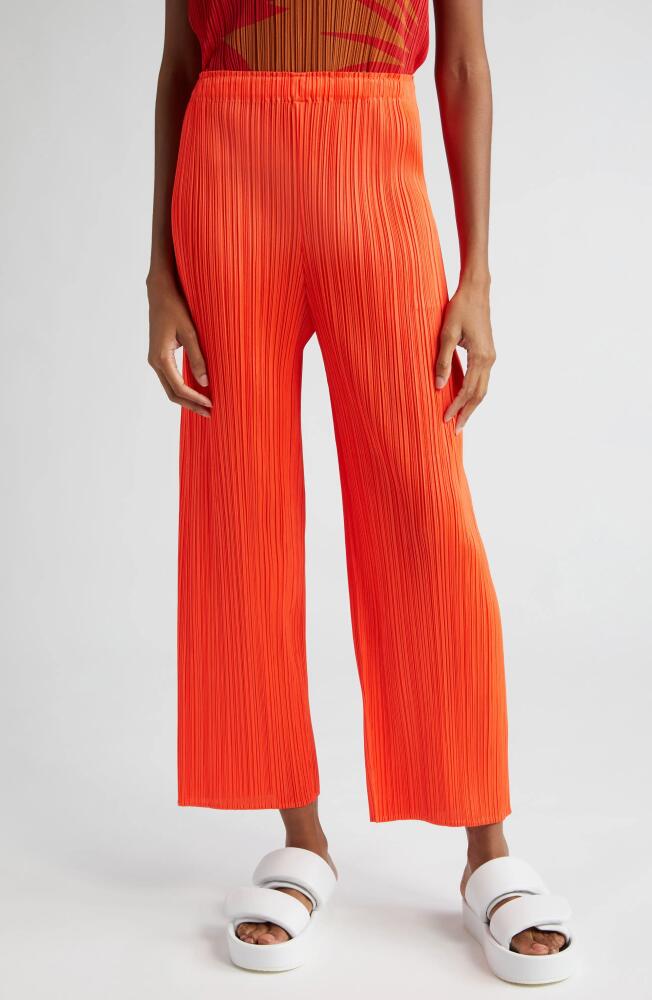 Pleats Please Issey Miyake Monthly Colors April Crop Wide Leg Pants in Habanero Cover