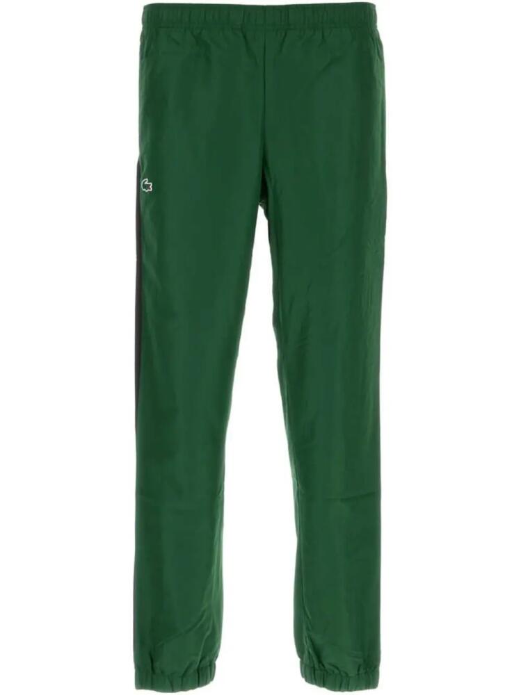 Lacoste side-stripe track pants - Green Cover