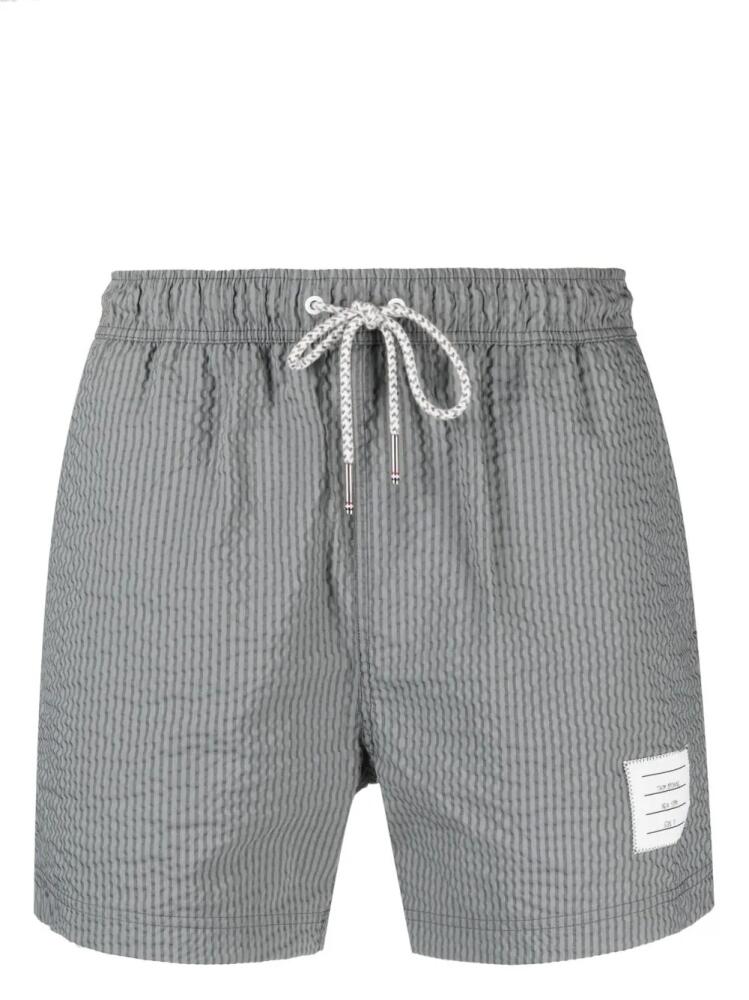 Thom Browne striped seersucker-texture swim shorts - Grey Cover