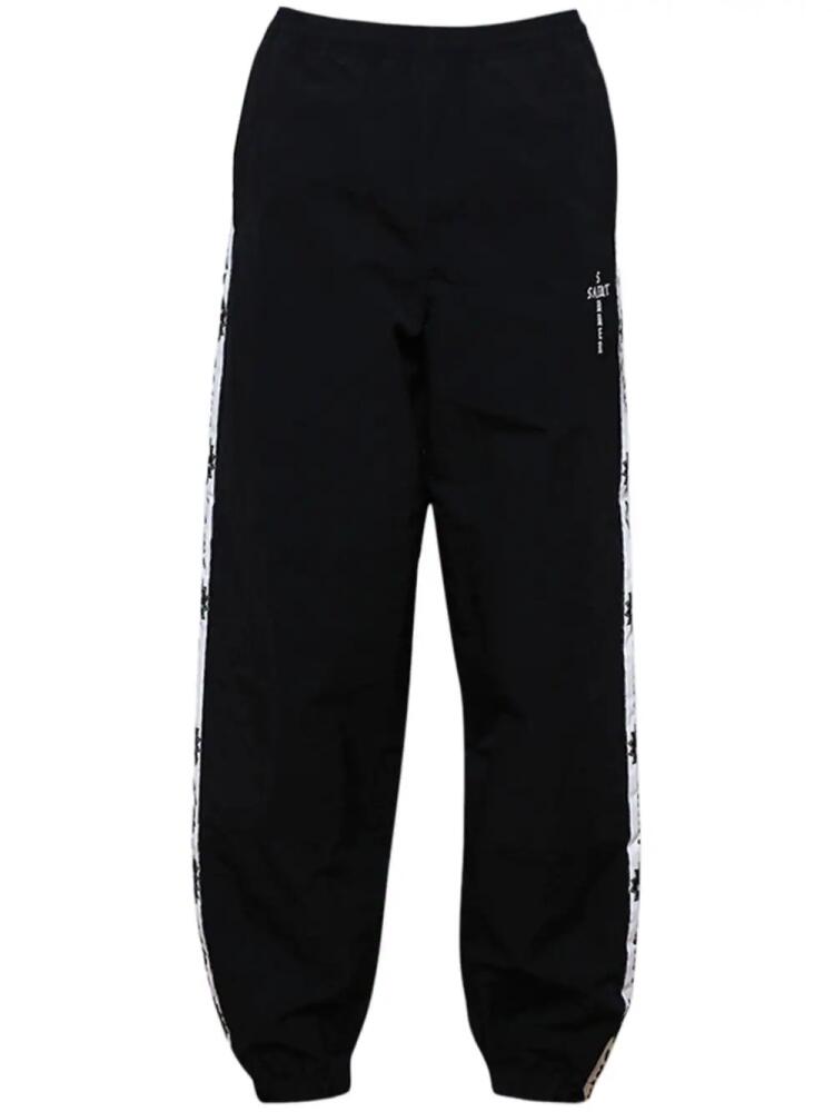 SAINT MXXXXXX logo-print track pants - Black Cover