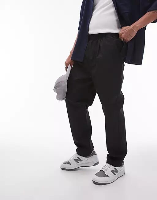 Topman tapered pants in black Cover