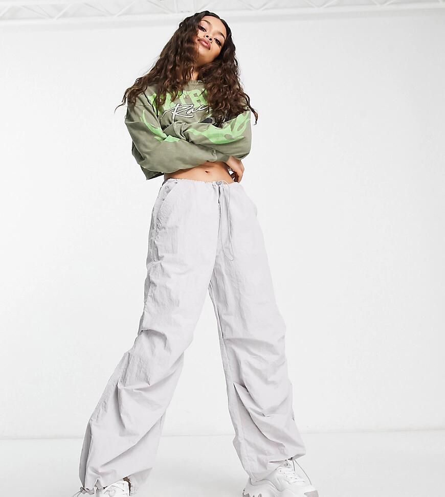 ASOS DESIGN Petite parachute cargo pants in gray Cover