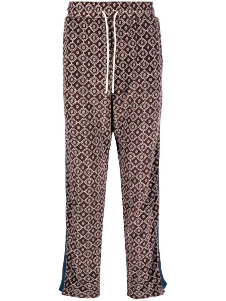 Drôle De Monsieur monogram-pattern velvet track pants - Brown Cover