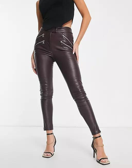 ASOS DESIGN faux leather skinny moto with zips in brown Cover