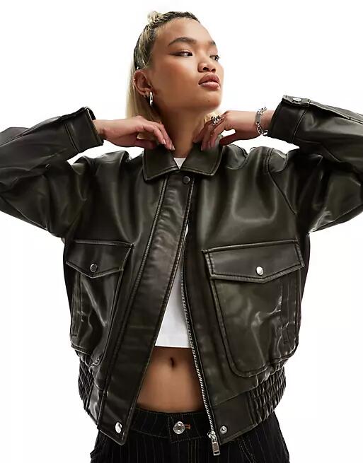 Only faux leather bomber jacket with oversized pockets in bleach wash black Cover