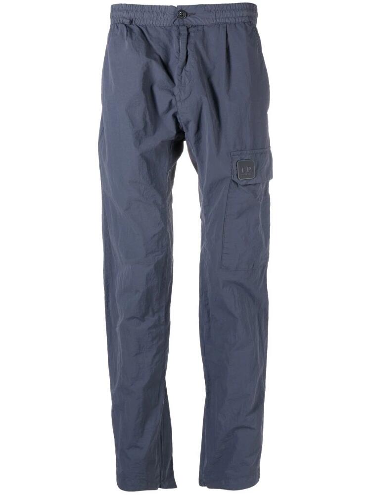 C.P. Company logo-patch detail trousers - Blue Cover