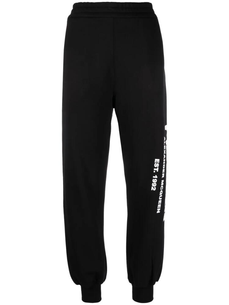 Alexander McQueen logo-print tapered track pants - Black Cover