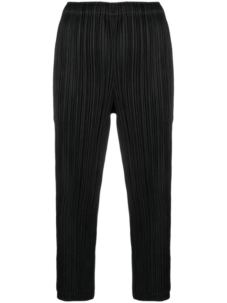 Pleats Please Issey Miyake pleated cropped trousers - Black Cover