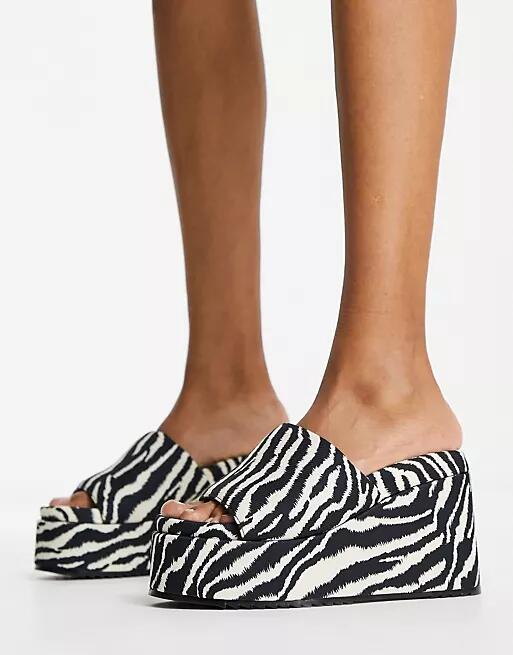 ASOS DESIGN Thierry mule wedges in zebra-Multi Cover